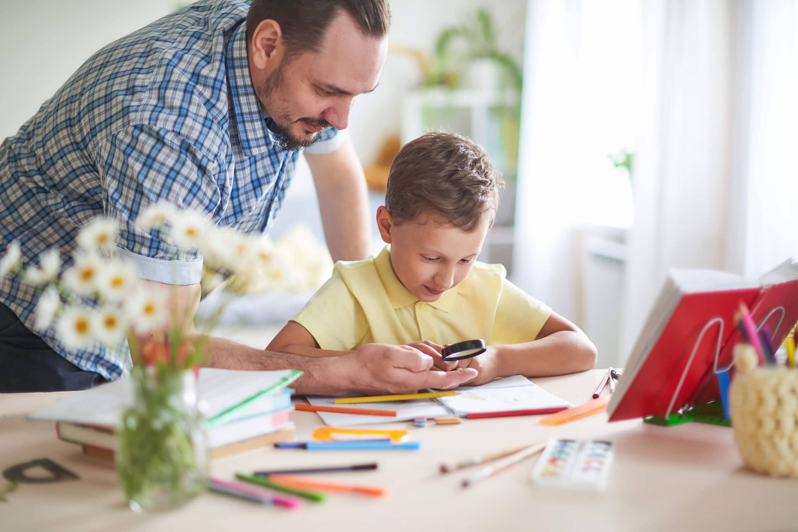 Dad helping son