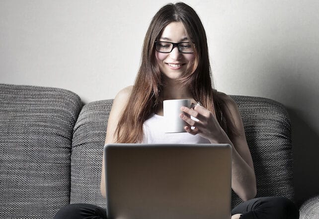 woman at computer researching lactose intolerance