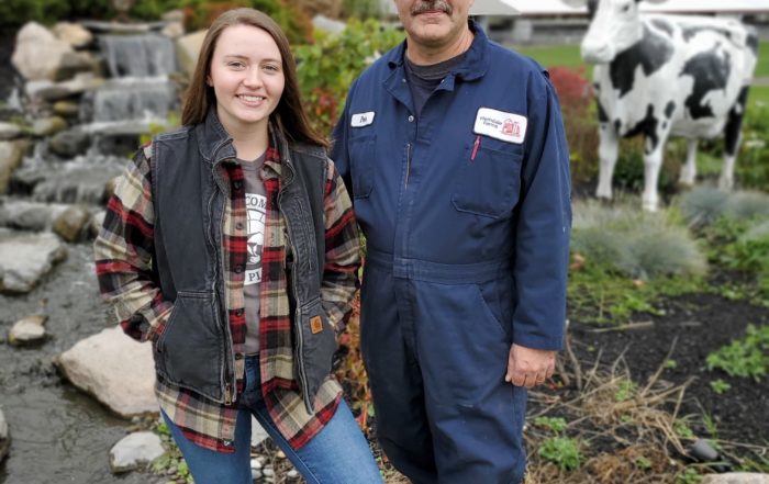 Dairy farmer Pete Maslyn and his daughter are pictured at Hemdake Farms.